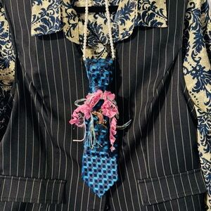 Neck Tie Necklace with striking blue and pink accents and pearls.